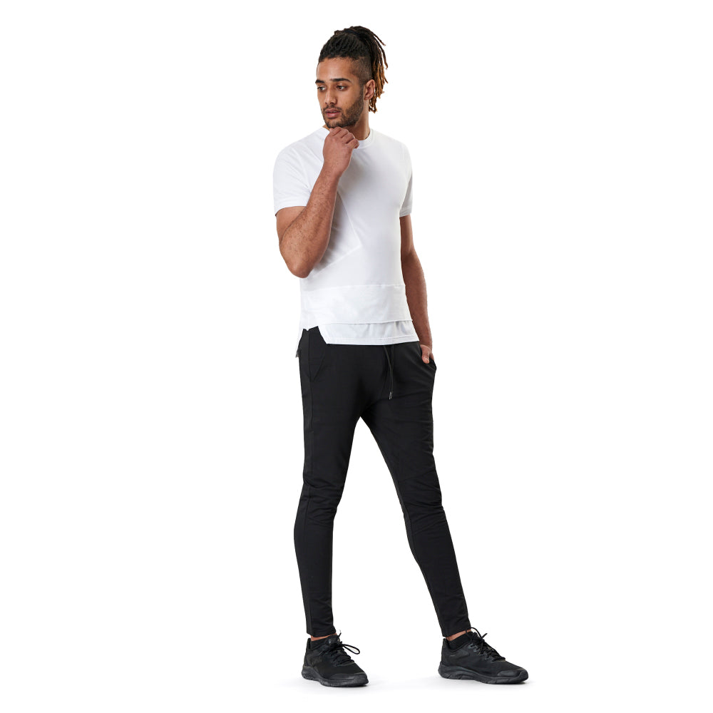 Man in white t-shirt and black pants.