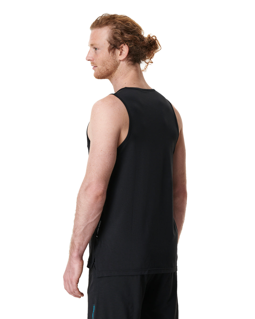 Man in black tank top and shorts.
