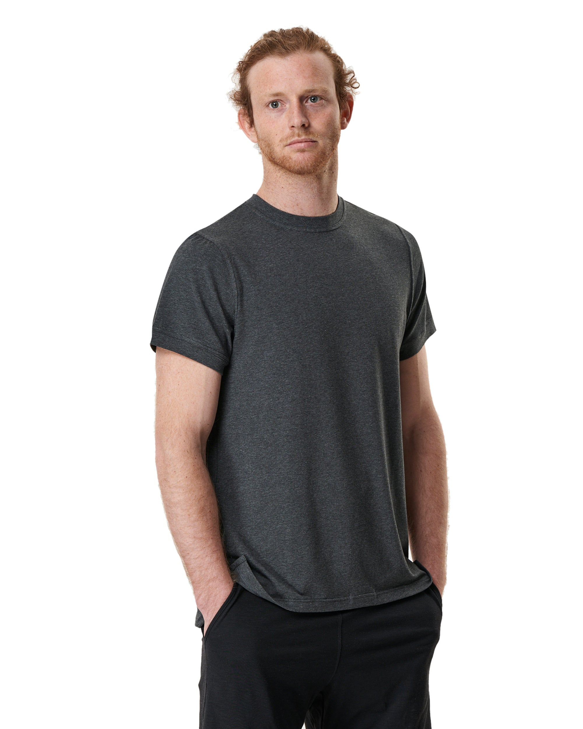 man wearing a grey men's yoga t-shirt by warrior addict front view 