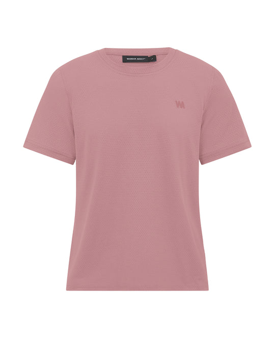 Pink t-shirt with perforated pattern.