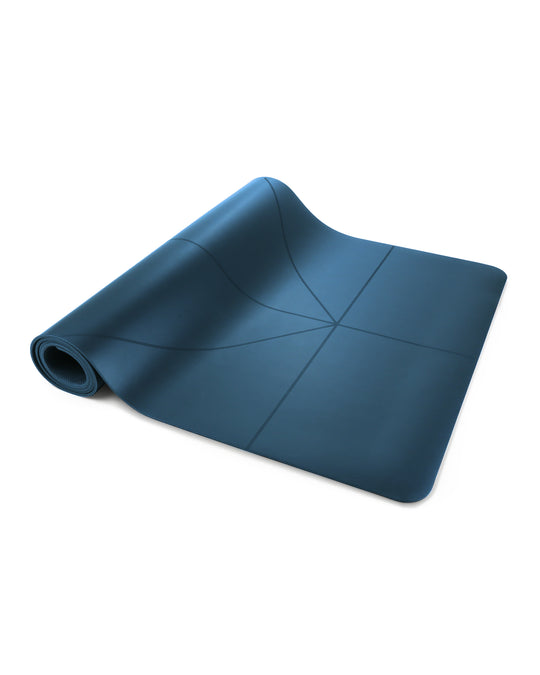 Blue yoga mat, partially rolled.