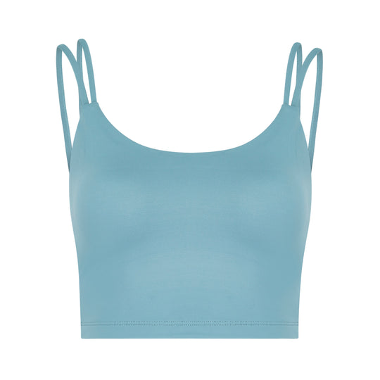 Light blue athletic crop top with double straps.