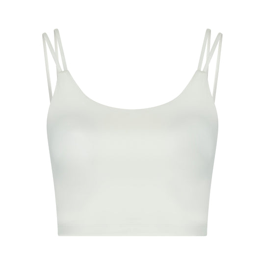 White crop top with spaghetti straps.