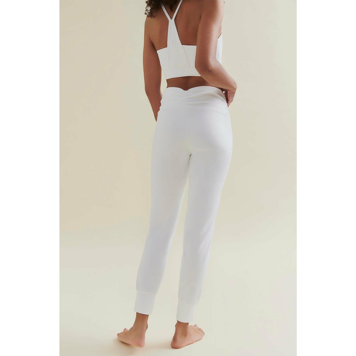 womens yoga pants in white by welliciouys model showing back 