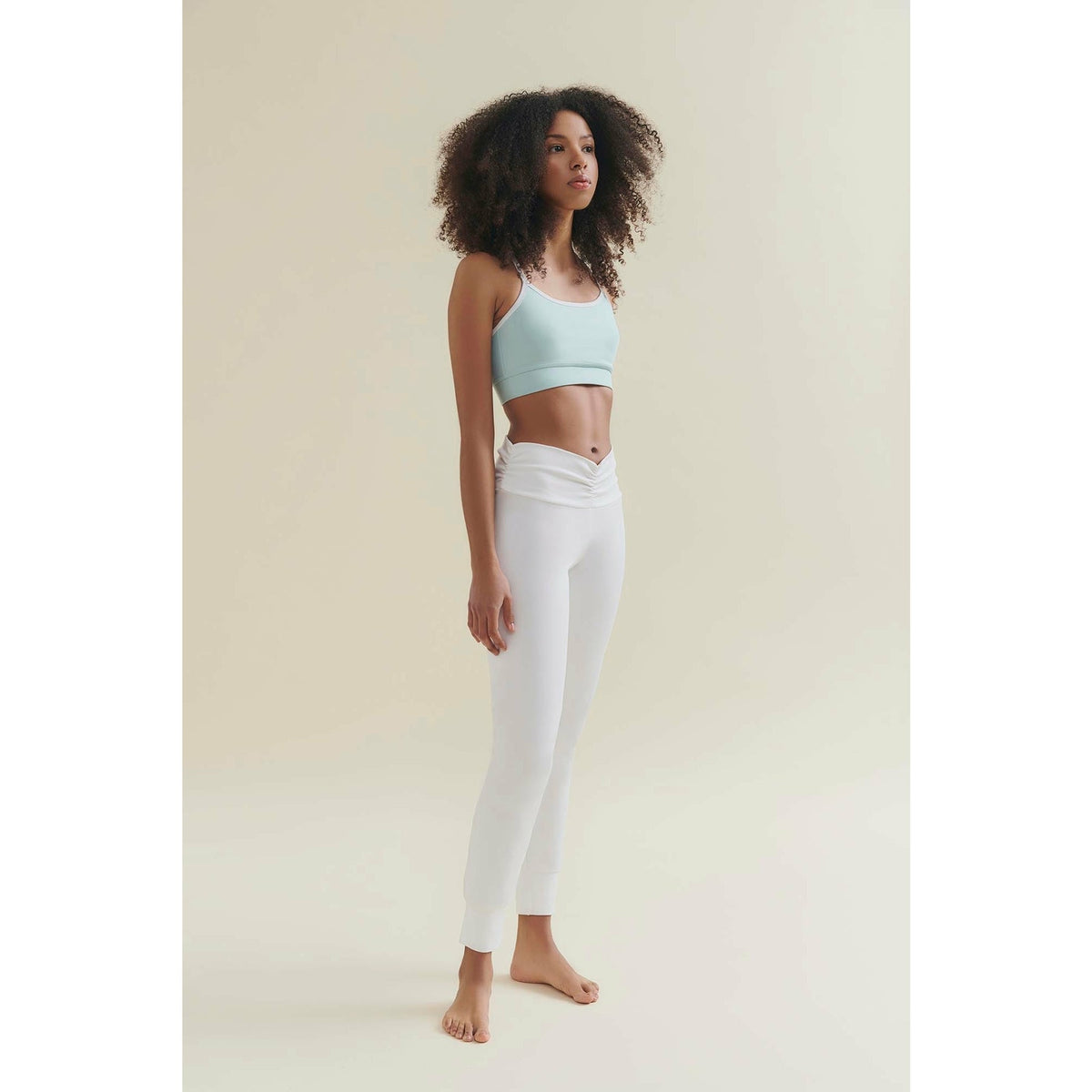 side whot of womens yoga pants in white by wellicious