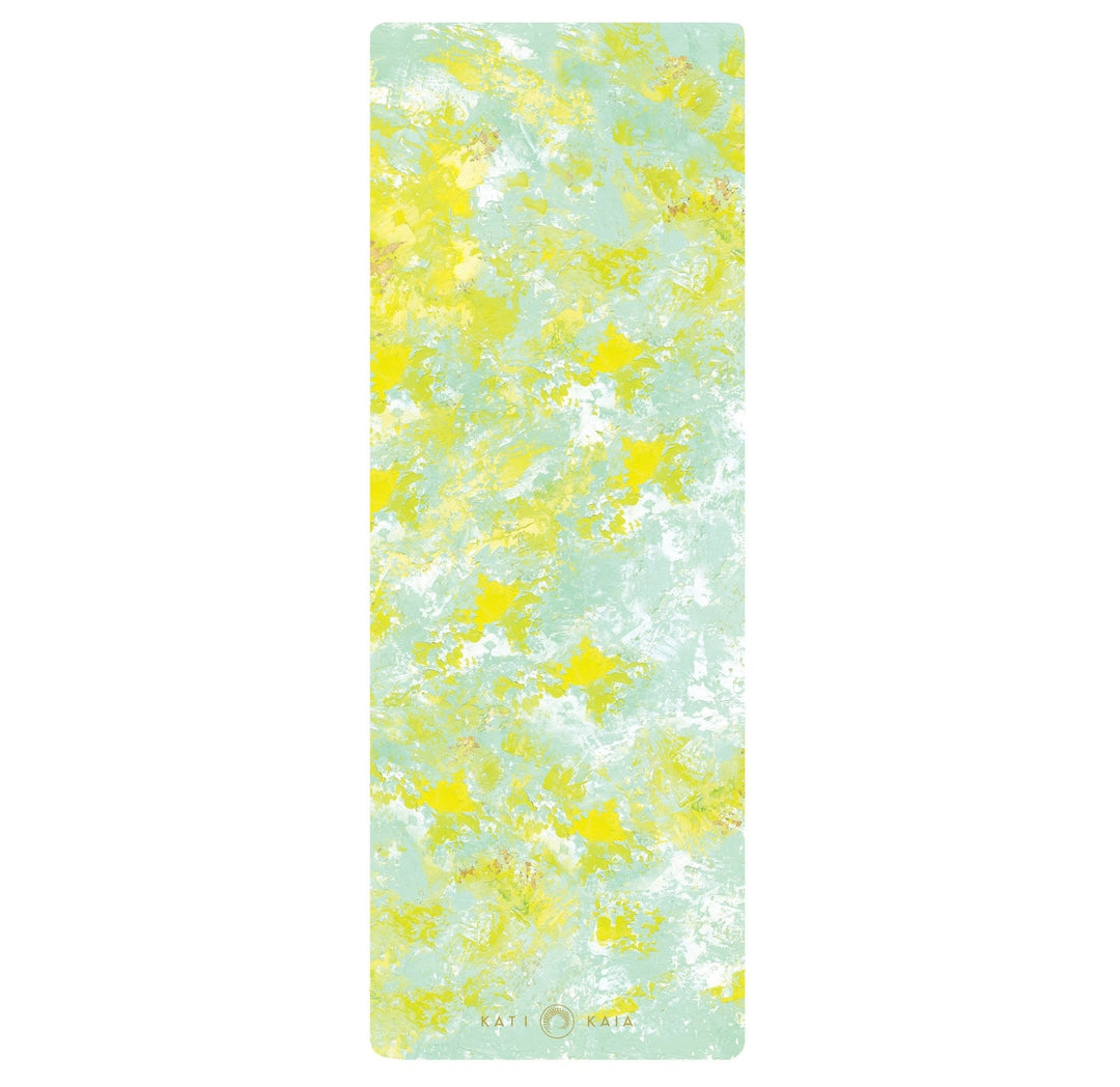 Yoga mat with yellow and light blue pattern.