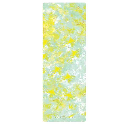 Yoga mat with yellow and light blue pattern.