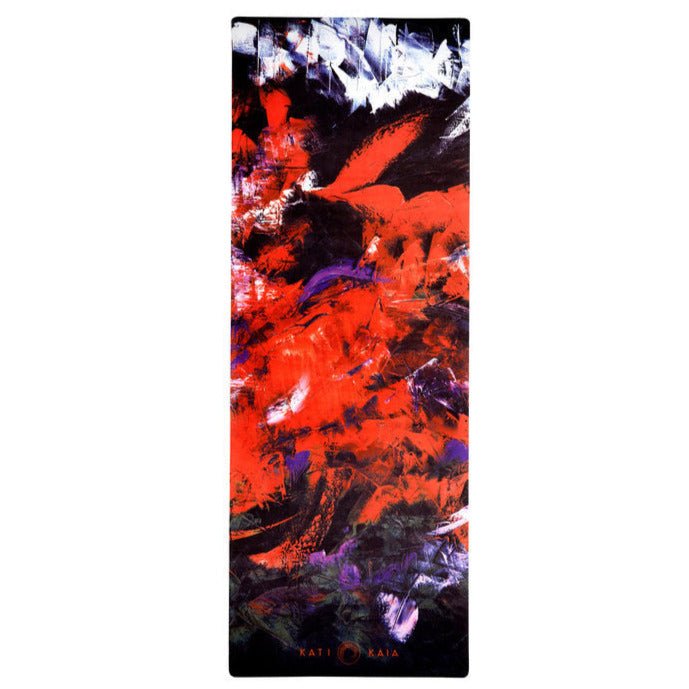 Abstract red, black, white, and purple yoga mat with brand name "KATI KAIA".