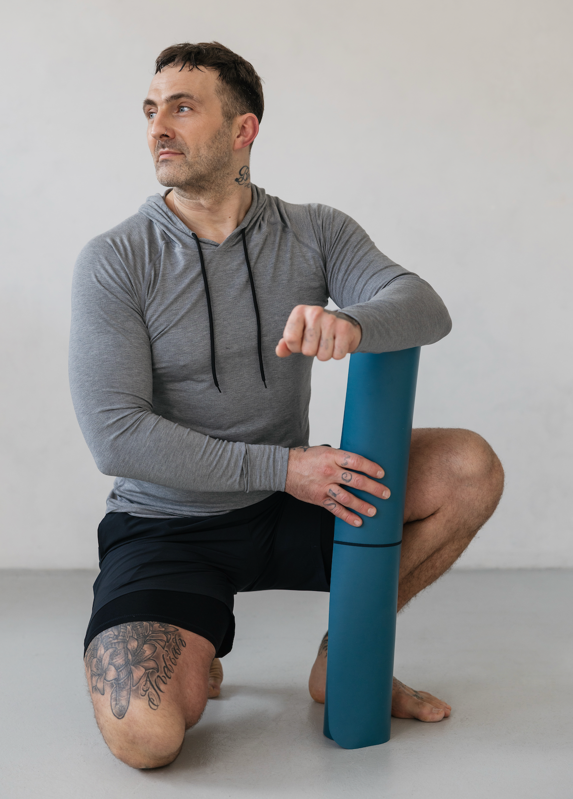 man in men's gym clothing by warrior addict