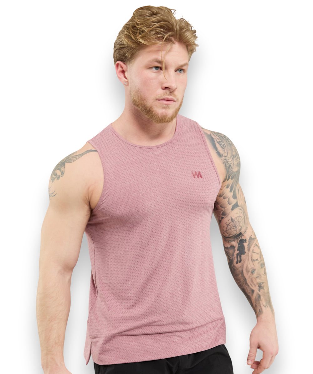 Man wearing a pink sleeveless shirt with a logo on a white background