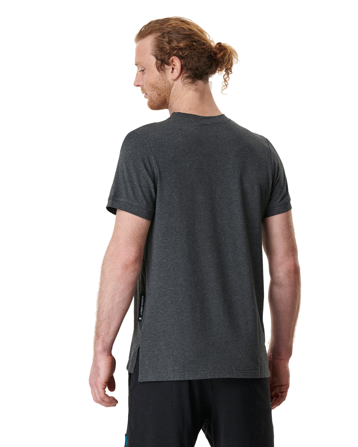 back view of man wearing grey mens yoga t-shirt by warrior addict 