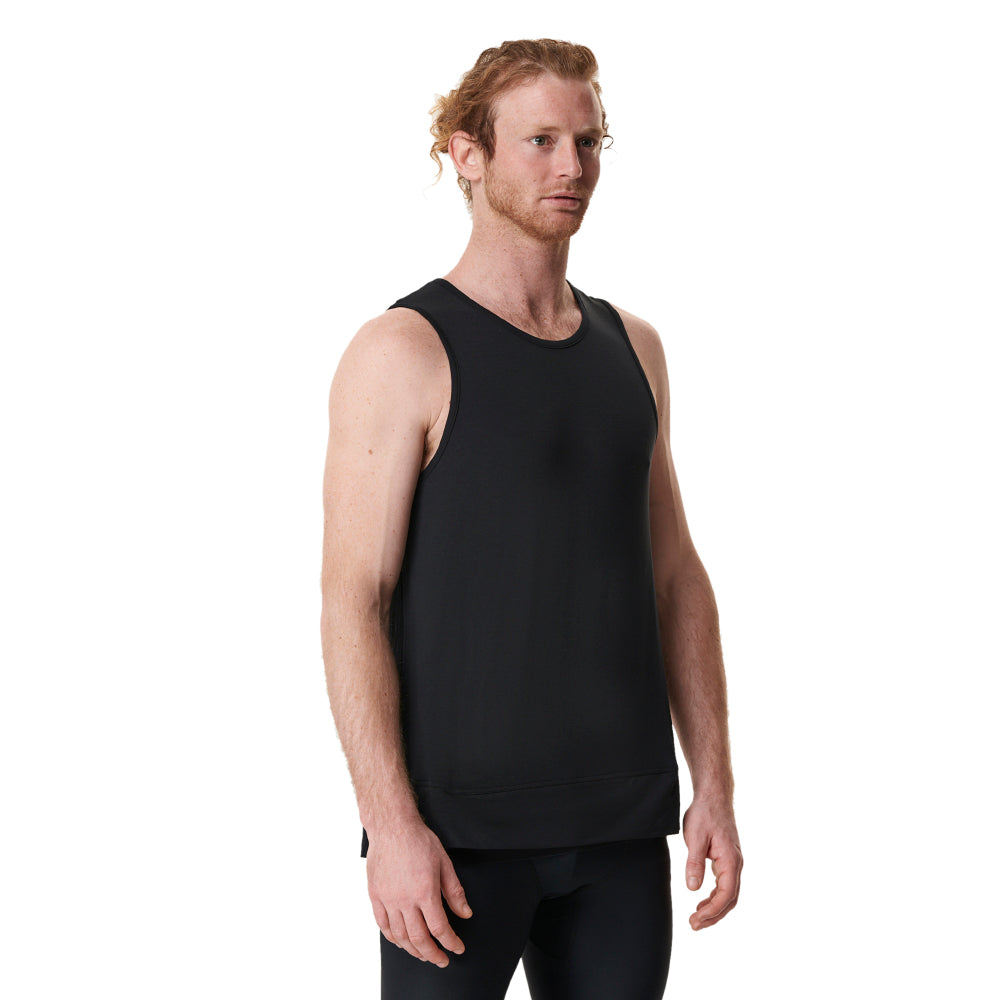 man wearing a black mens yoga top that doesn't ride up by warrior addict 