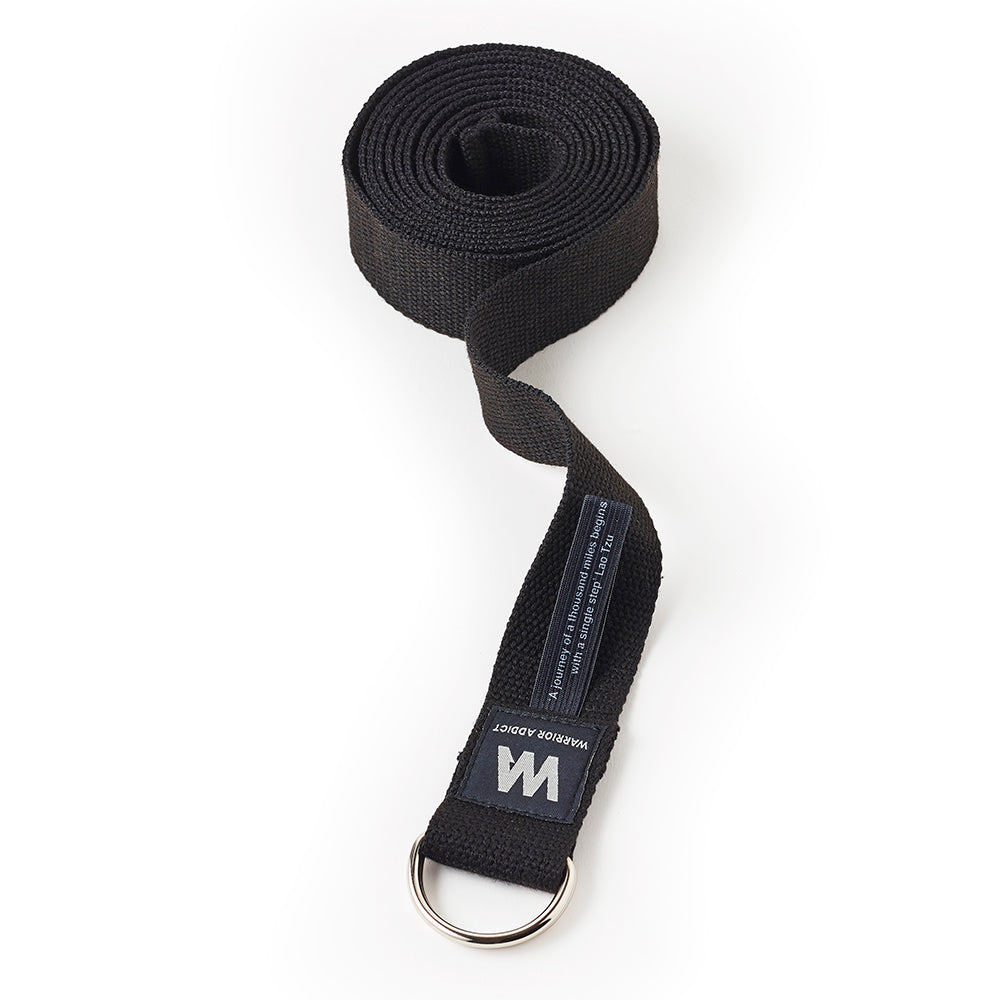 black yoga strap with sliver buckle rolled by warrior addict 