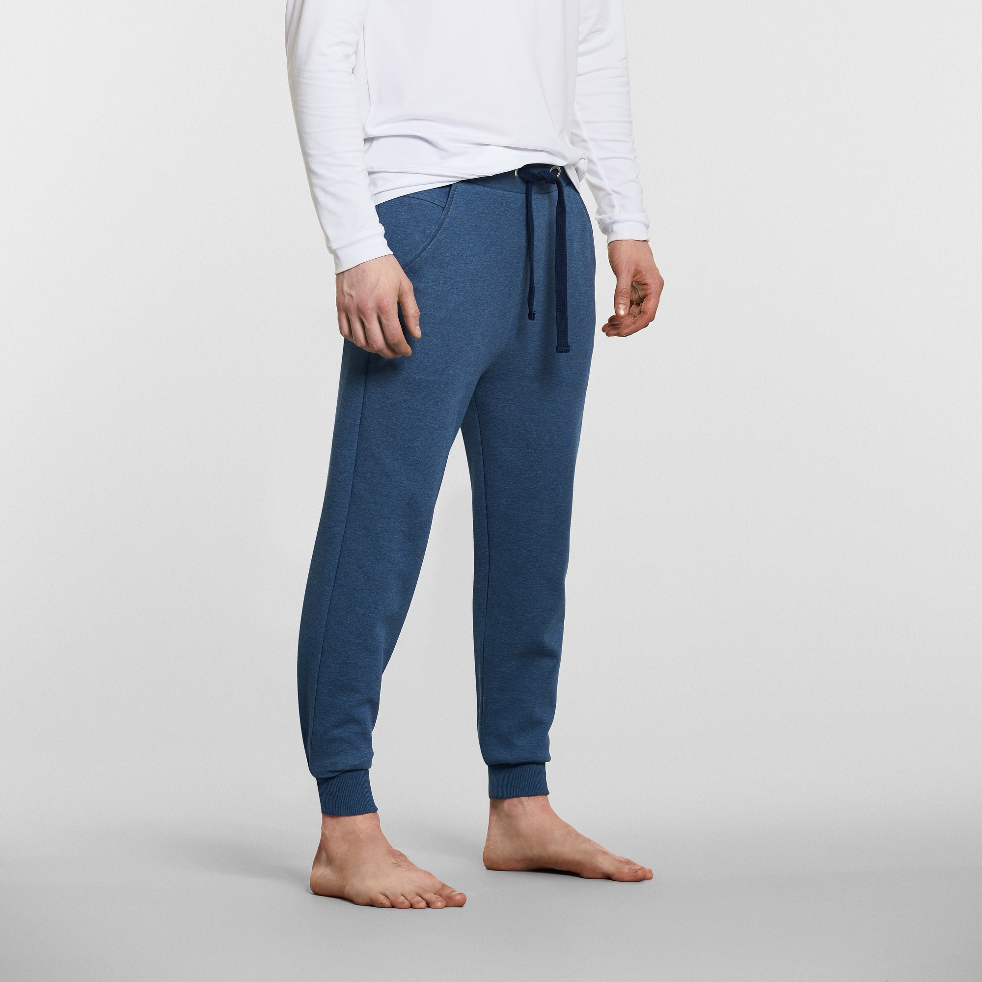 man in blue mens yoga pants by warrior addict 