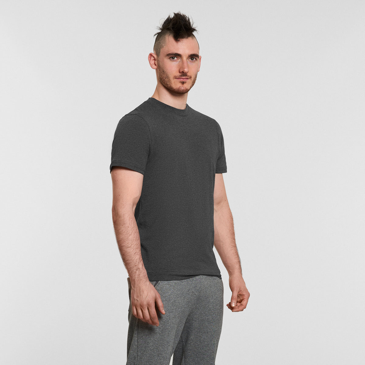 man wearing grey mens yoga t-shirt by warrior addict 