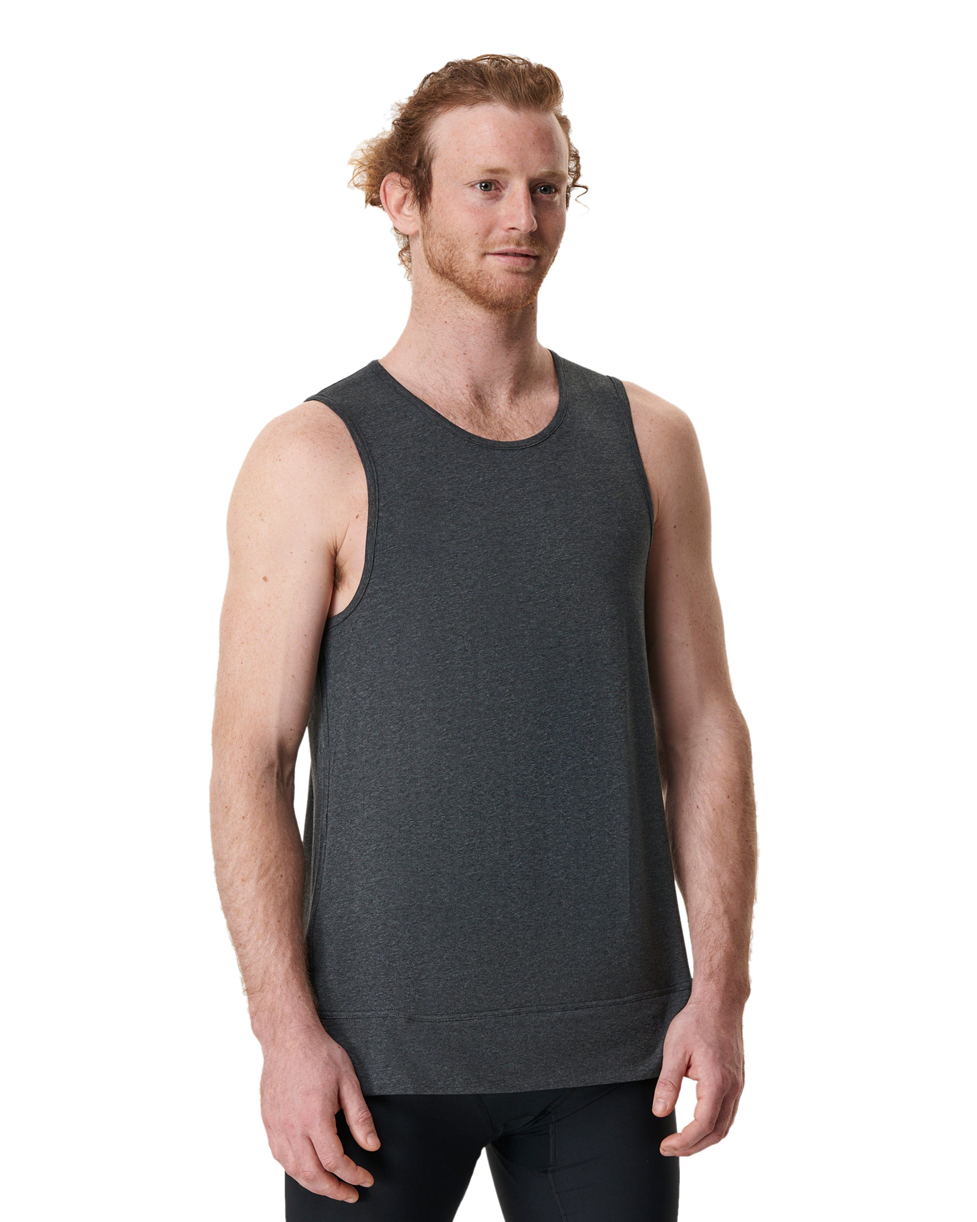 man wearing grey mens yoga top that does not ride up by warrior addict 
