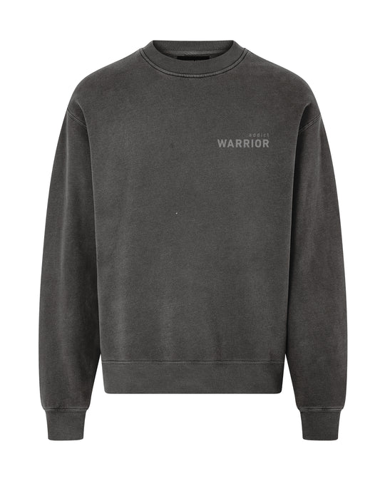 Faded faded black  regular fit crew sweatshirt  made from cotton and polyester blend with 'Warrior Addict'm text on a white background
