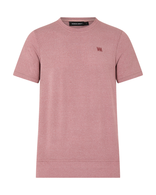 Salmon-colored t-shirt with a textured, dotted pattern and a red letter "W" on the chest.