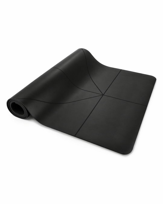 Black  warrior addict yoga mat with alignment lines made from PU and natural rubber, 4.5mm thickness part rolled on a white background