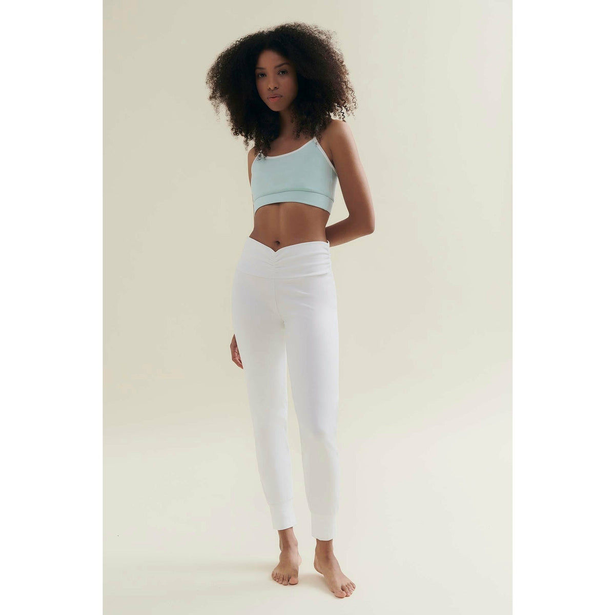 womens yoga pants by wellicious in white worn by a model 